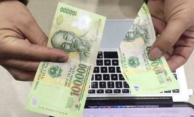 Tiền rách có đổi được không? Cách đổi tiền rách tại các ngân hàng 6 huong dan cach doi tienrach tai ngan hang