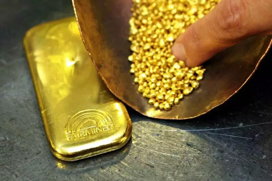 Đồng đô la tăng khiến giá vàng thế giới trượt dốc